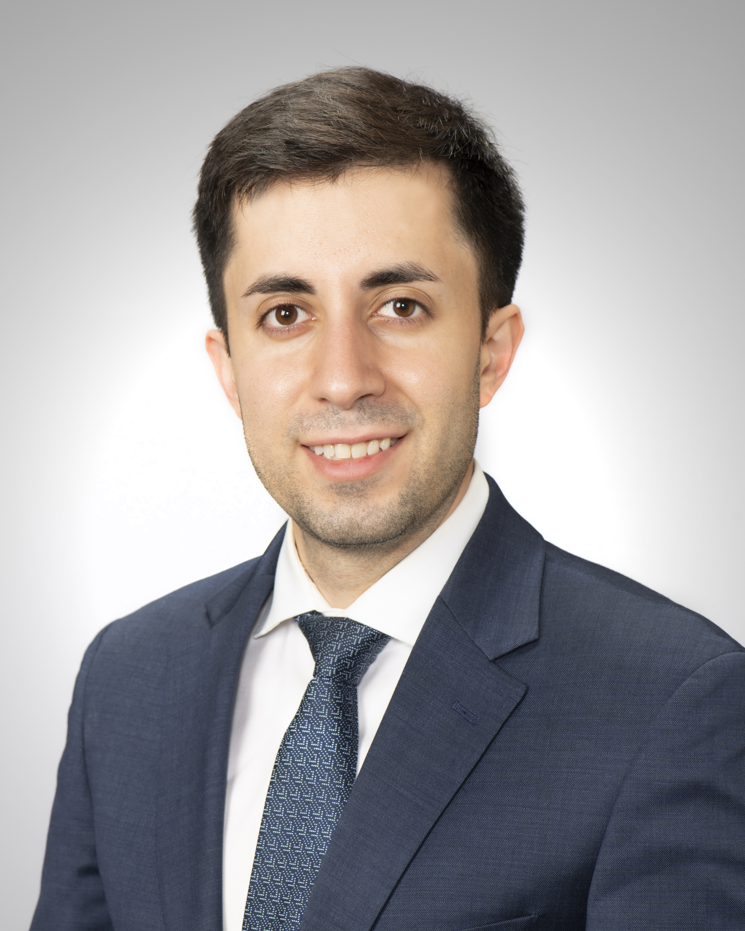 Portrait of Dr. Hasan Khosravi, board-certified dermatologist at AXIS Dermatology